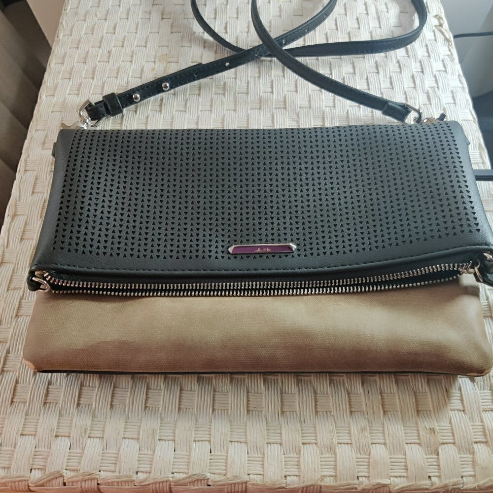 Purse,  Foldover in black & tan. Ideal for Travel with 2 zippered  compartments